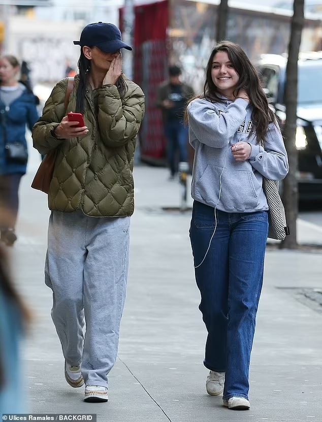 Katie Holmes and her daughter Suri Cruise take a stroll in New York City on March 29, 2023