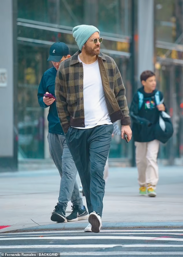 Exploring Ryan Reynolds’ Cool Fall Fashion: Plaid Jacket and Blue Beanie in NYC on Oct 25, 2023