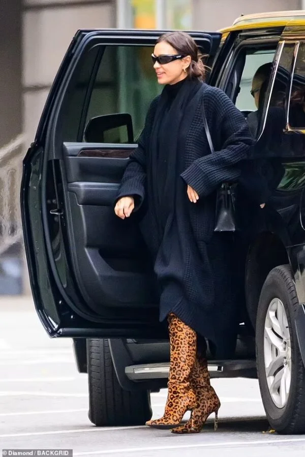 Irina Shayk Roars Into NYC: Thigh-High Leopard-Print Boots and a Birkin Bag Take Center Stage on Nov 21, 2023