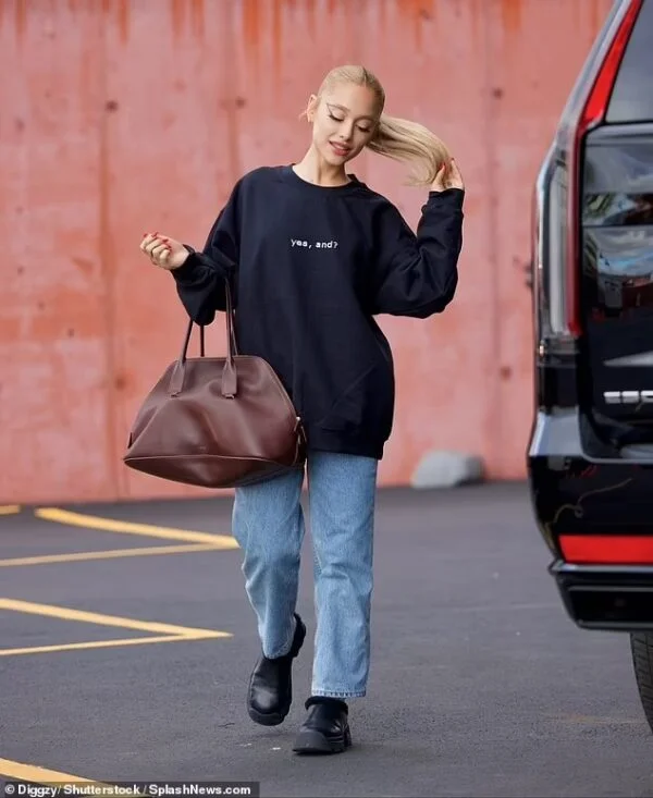 Ariana Grande’s NYC Stroll in Proenza Schouler: Winter Chic Unleashed! on Jan4, 2024