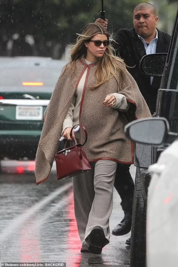Sofia Richie’s Rainy Day Chic: Luxury Maternity Fashion on Feb 6, 2024